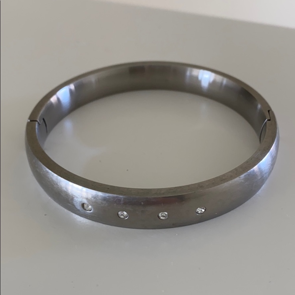 Silver bracelet /4 shiny stones!  Steel and heavy!